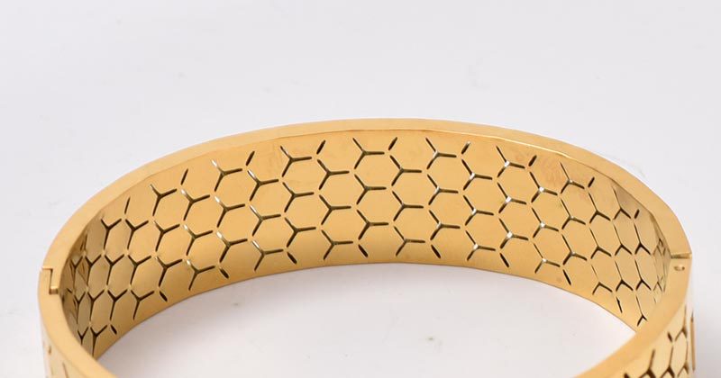 Wide Bracelet For Bangle Made Of Titanium Steel Featuring A Golden Finish