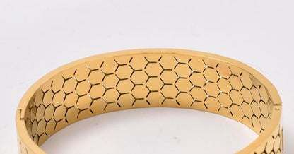 Wide Bracelet For Bangle Made Of Titanium Steel Featuring A Golden Finish