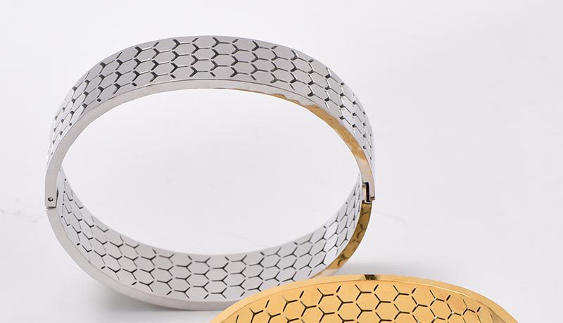 Wide Bracelet For Bangle Made Of Titanium Steel Featuring A Golden Finish