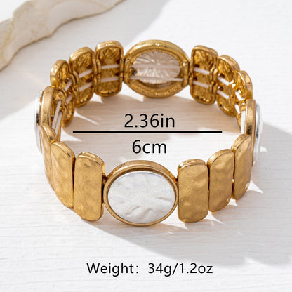 Two Tone Shell Bracelet For Women In Golden Plated Alloy Featuring Mother Of Pearl Inlay