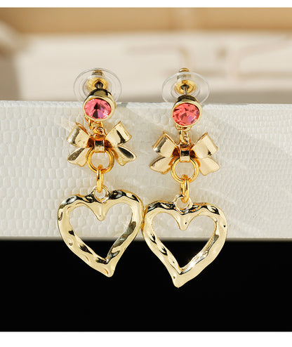 Heart Shape Stud Earrings For Women In Elegant Golden Finish