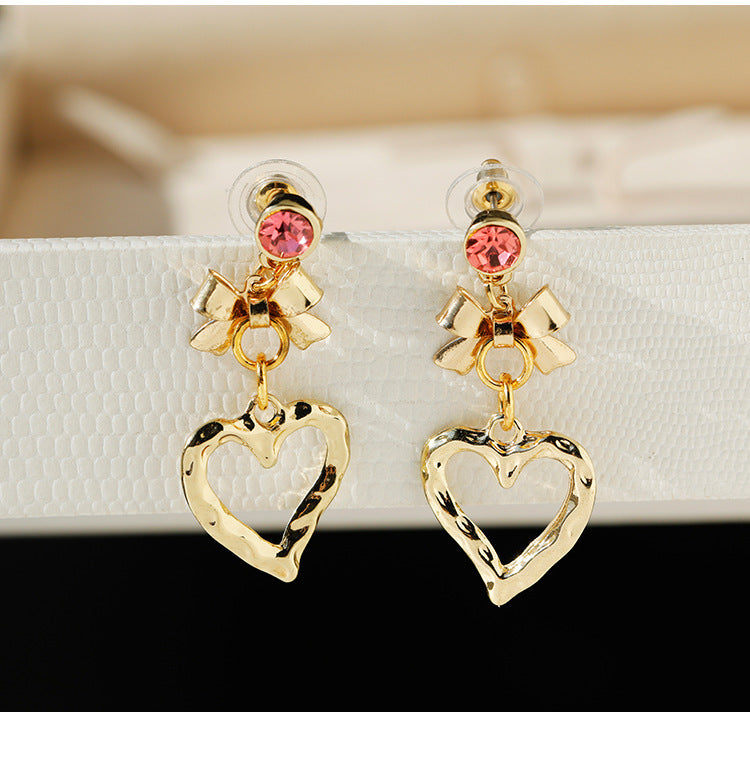 Heart Shape Stud Earrings For Women In Elegant Golden Finish