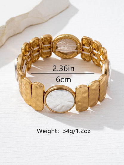 Two Tone Shell Bracelet For Women In Golden Plated Alloy Featuring Mother Of Pearl Inlay