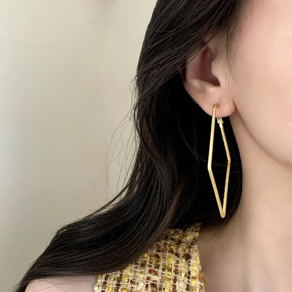 Geometric Copper Earrings For Women In Golden Featuring Witches Knot Jewelry Design
