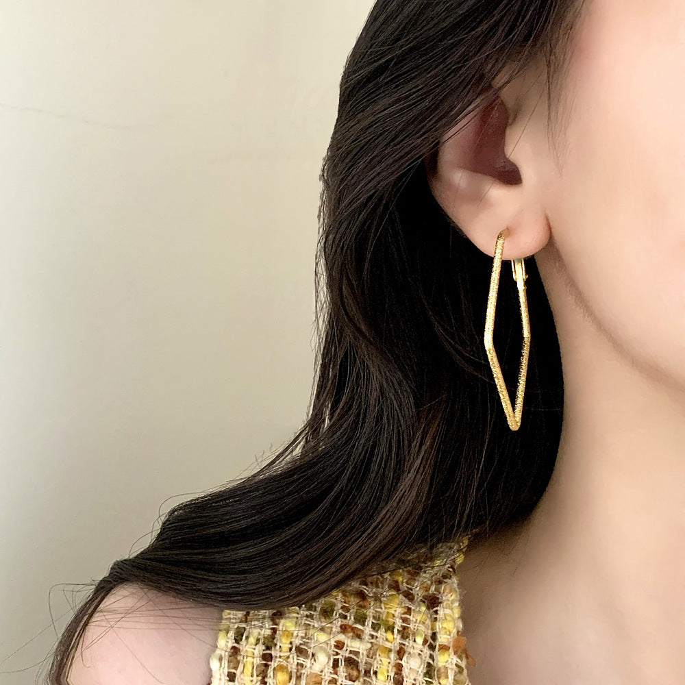Geometric Copper Earrings For Women In Golden Featuring Witches Knot Jewelry Design