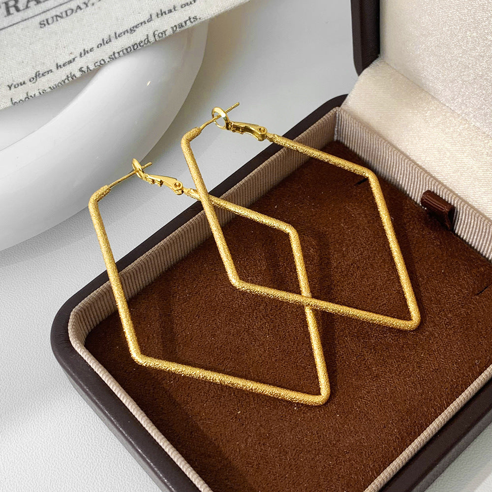 Geometric Copper Earrings For Women In Golden Featuring Witches Knot Jewelry Design