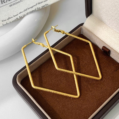Geometric Copper Earrings For Women In Golden Featuring Witches Knot Jewelry Design