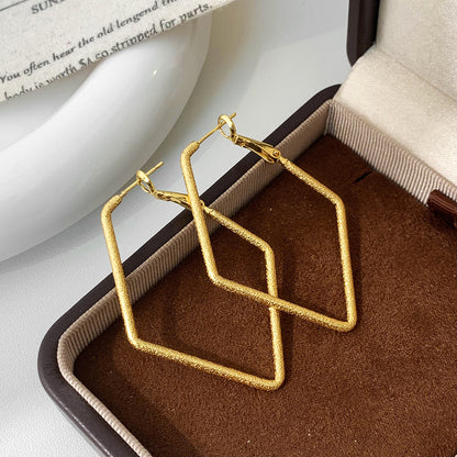 Geometric Copper Earrings For Women In Golden Featuring Witches Knot Jewelry Design