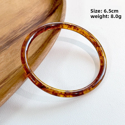 Handmade Round Resin Bangle For Women Featuring Golden Sequins Inlay