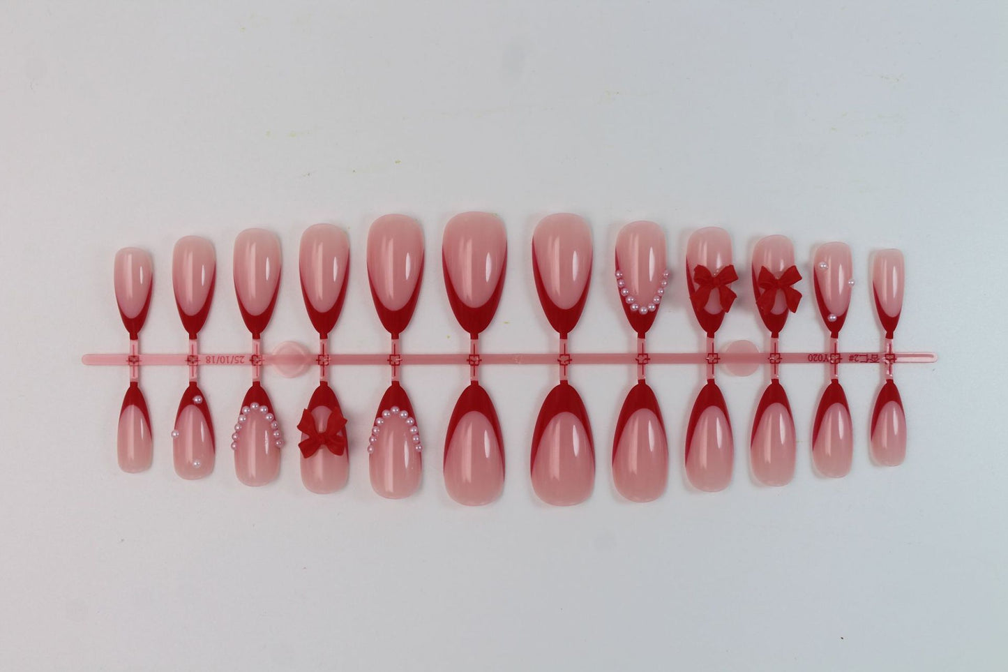 French Style Bow Tie Nail Tips For Elegant Manicure