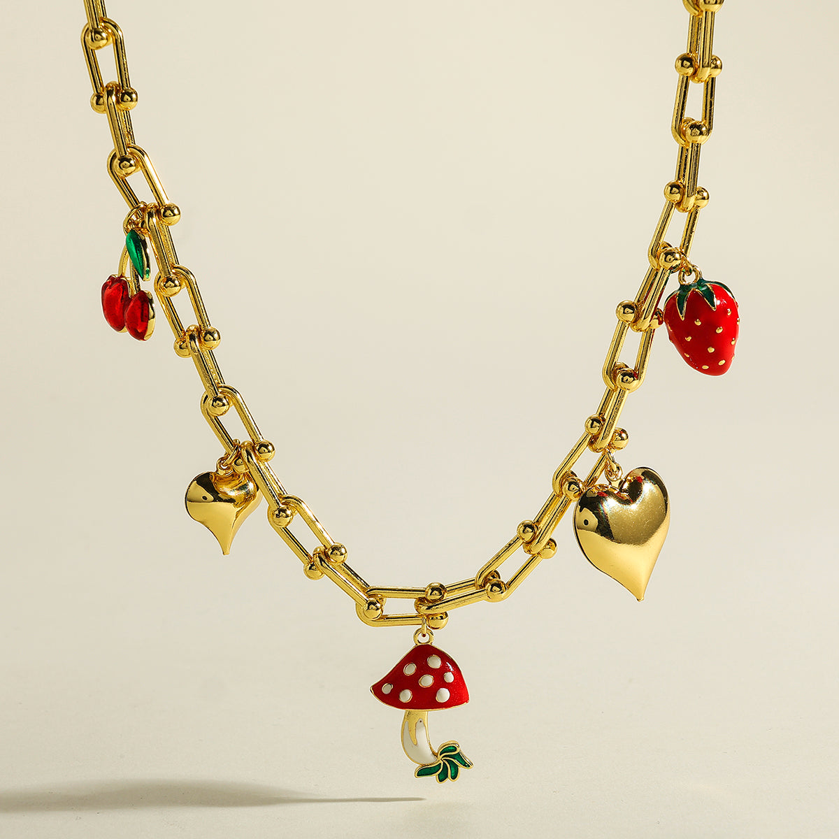 Polished Cherry Pendant Necklace For Women In Copper With 18K Real Gold Plated Finish And Horseshoe Buckle Chain