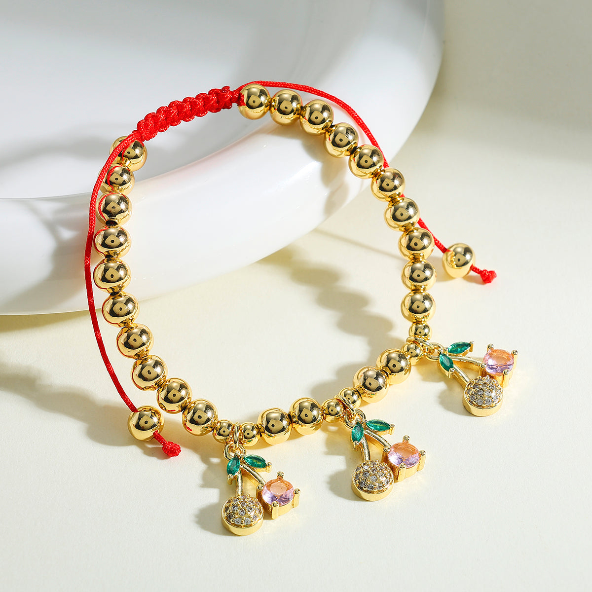Cherry Bracelet For Women In Copper With 18K Real Gold Plated Finish Featuring Zircon Inlay And Beaded Chain