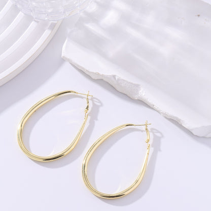 Simple Style Round Earrings For Women In Golden Metal Featuring Electroplated Finish