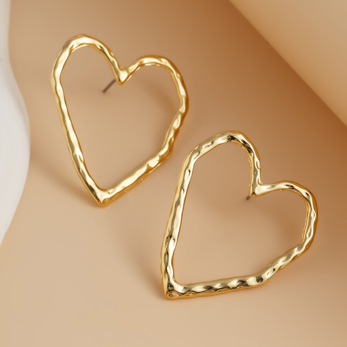 Exaggerated Heart Shape Earrings For Women In Golden Alloy, Stylish And Bold Design