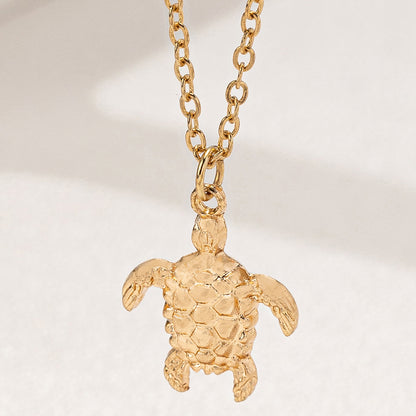 Tortoise Pendant Necklace For Women In Golden Alloy, Perfect For School Wear Featuring A Stylish Turtle Design