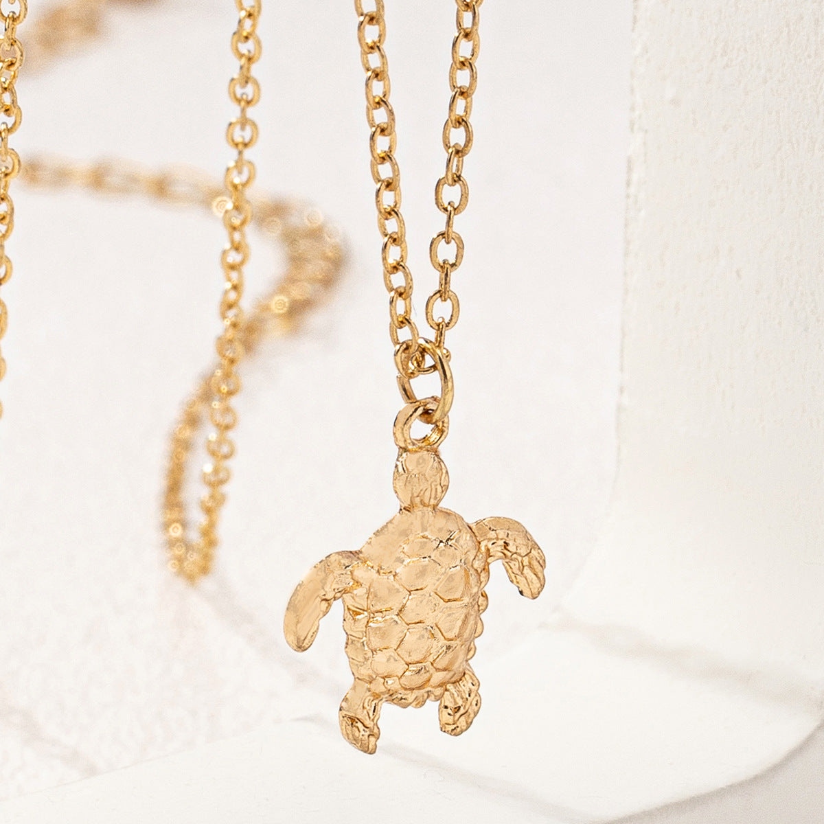 Tortoise Pendant Necklace For Women In Golden Alloy, Perfect For School Wear Featuring A Stylish Turtle Design