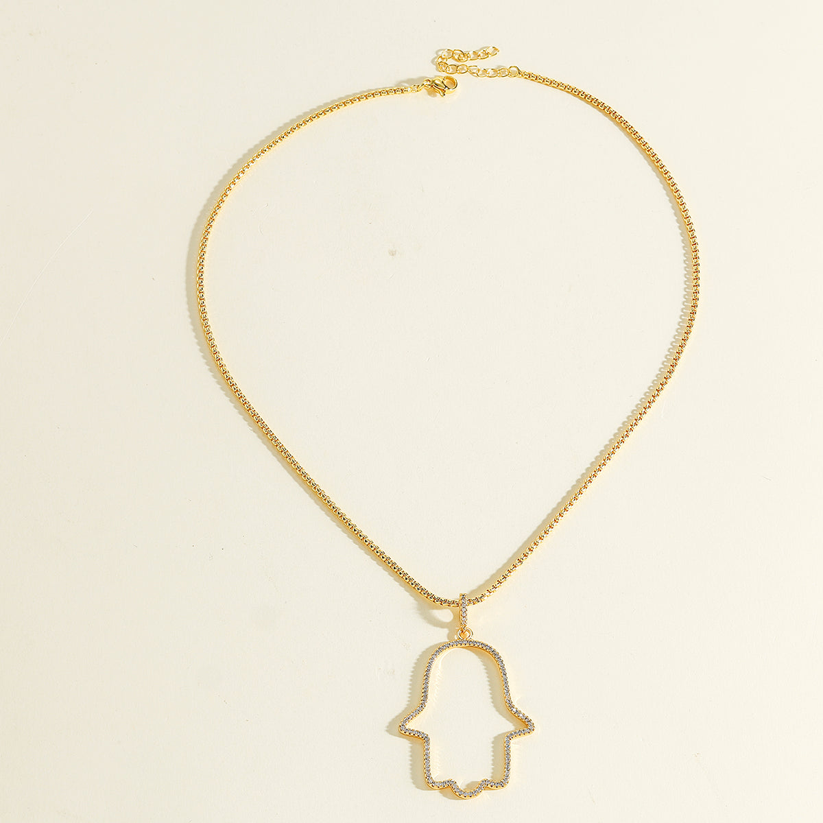 Palm Pendant Necklace For Women In Copper With 18K Real Gold Plated Finish And Zircon Inlay On Box Chain