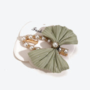 Elegant Pearl Hollow Out Hepburn Style Bow Hair Clip - Light Green
