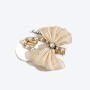 Elegant Pearl Hollowed-Out Hepburn-Style Bow Hair Clip - Apricot Color