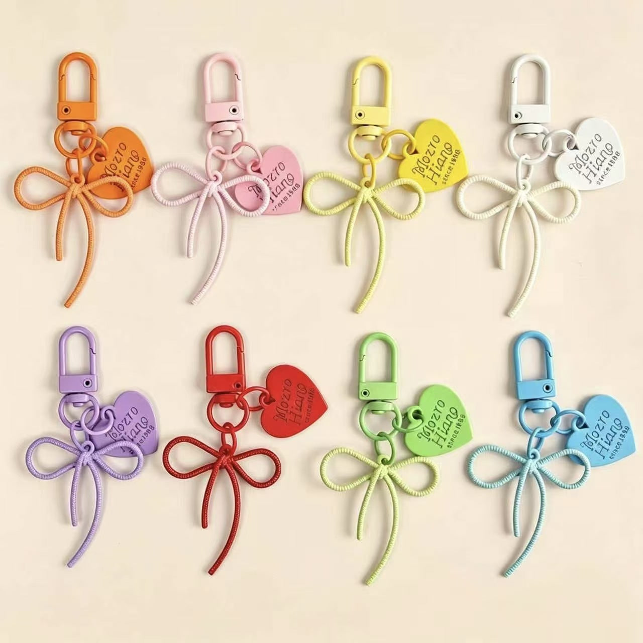 Bow Tie Bag Charm Key Chain In Colour, Featuring Durable Alloy Material