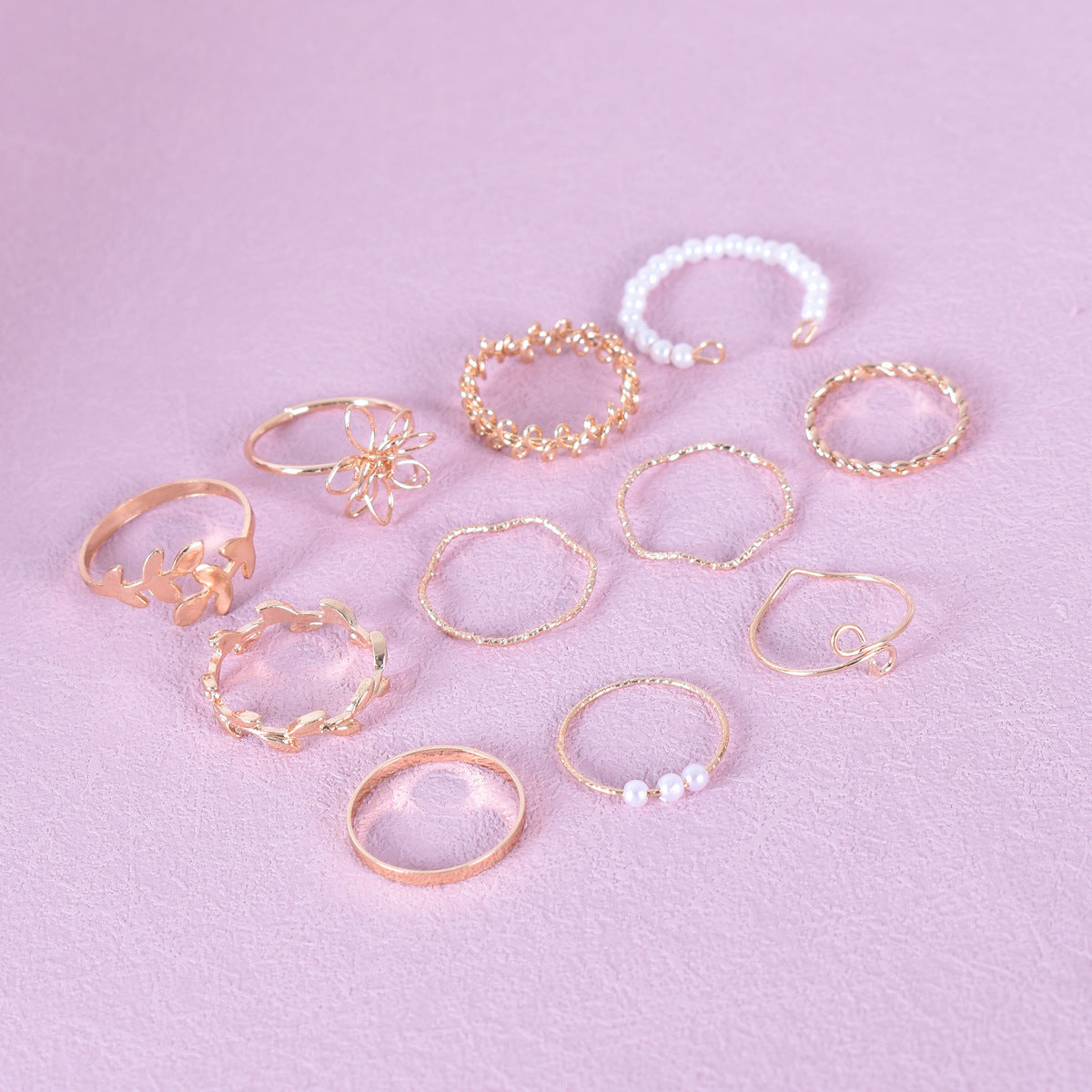 Set Of 10 Electroplated Gold Flowers Rings For Women With Imitation Pearl Inlay Made Of Zinc Alloy