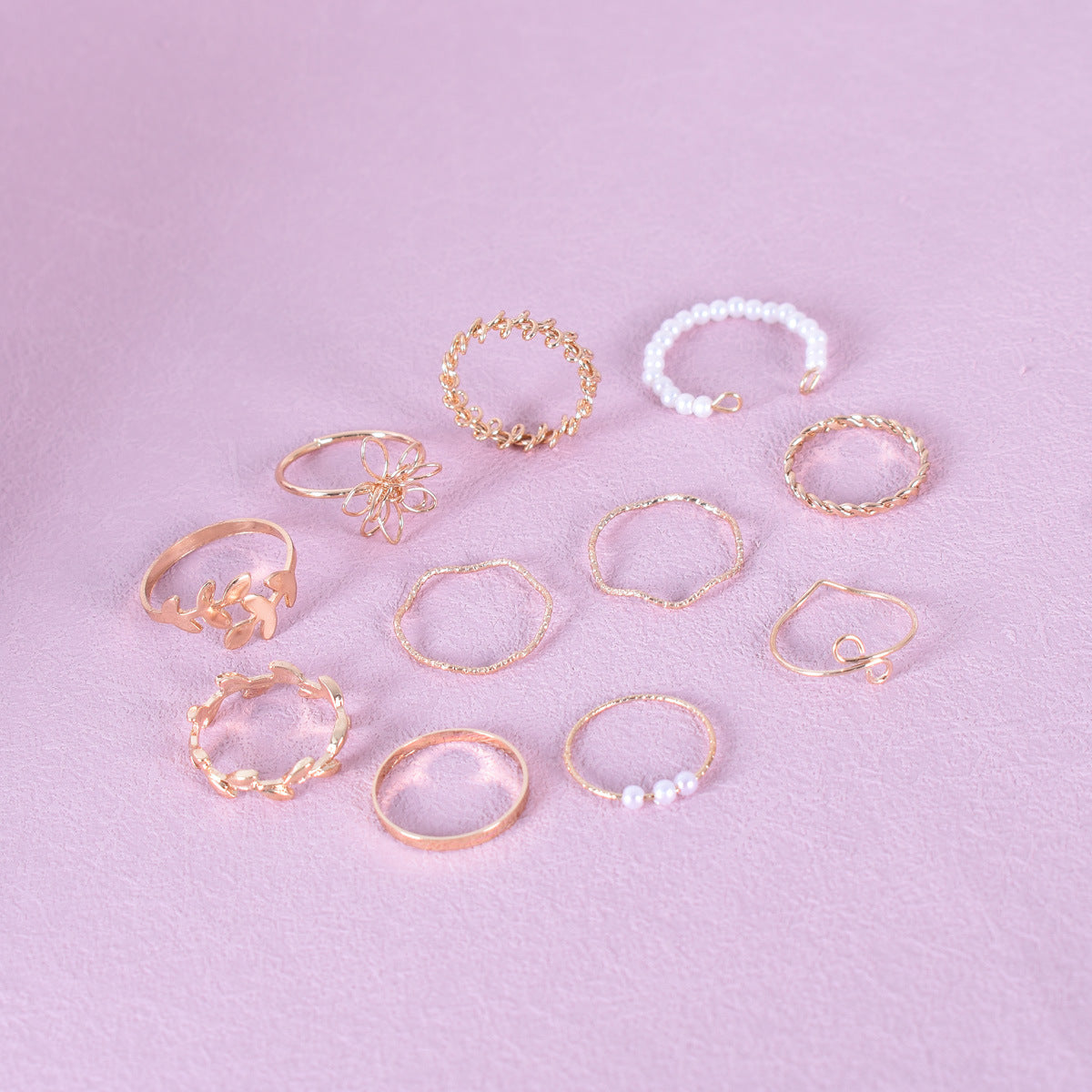Set Of 10 Electroplated Gold Flowers Rings For Women With Imitation Pearl Inlay Made Of Zinc Alloy