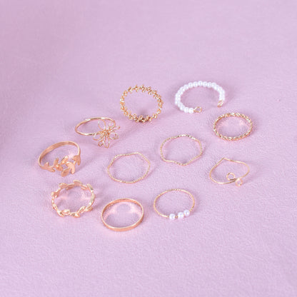 Set Of 10 Electroplated Gold Flowers Rings For Women With Imitation Pearl Inlay Made Of Zinc Alloy