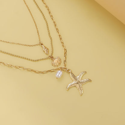 Retro Three Layer Shell Necklace For Women In Gold Featuring KC Golden Plated Alloy Pendant