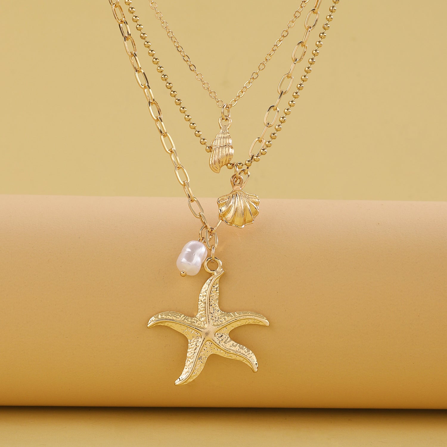 Retro Three Layer Shell Necklace For Women In Gold Featuring KC Golden Plated Alloy Pendant
