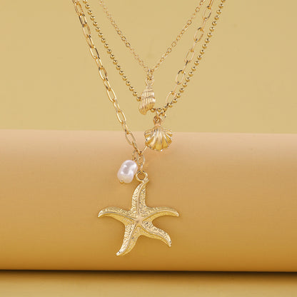 Retro Three Layer Shell Necklace For Women In Gold Featuring KC Golden Plated Alloy Pendant