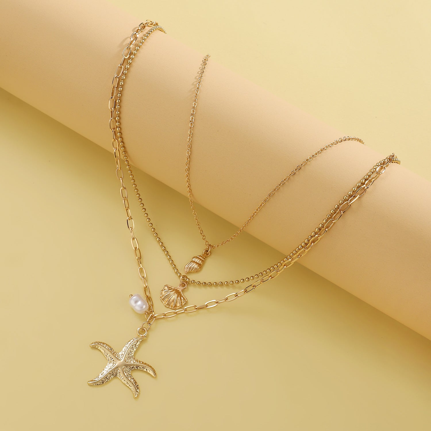 Retro Three Layer Shell Necklace For Women In Gold Featuring KC Golden Plated Alloy Pendant