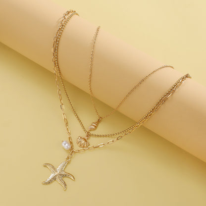 Retro Three Layer Shell Necklace For Women In Gold Featuring KC Golden Plated Alloy Pendant