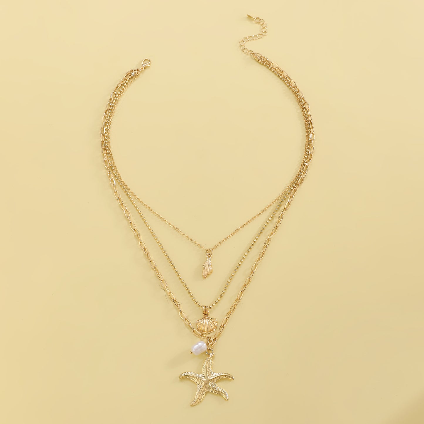Retro Three Layer Shell Necklace For Women In Gold Featuring KC Golden Plated Alloy Pendant
