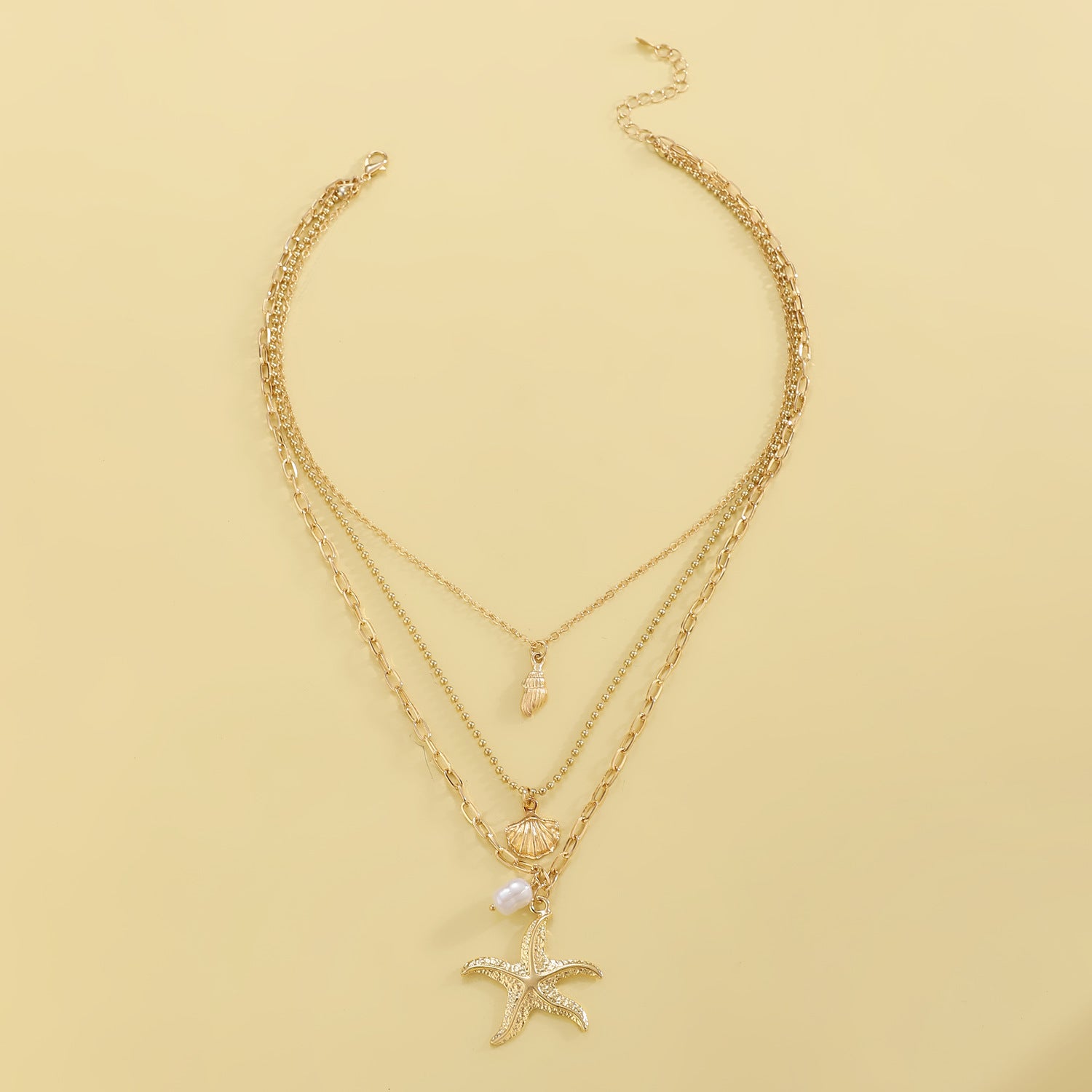 Retro Three Layer Shell Necklace For Women In Gold Featuring KC Golden Plated Alloy Pendant