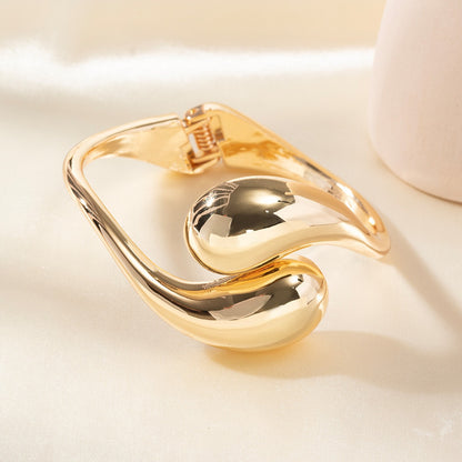 Simple Style Gold Alloy Bangle With Water Droplets Pattern Featuring Electroplated Finish