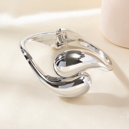 Simple Style Gold Alloy Bangle With Water Droplets Pattern Featuring Electroplated Finish