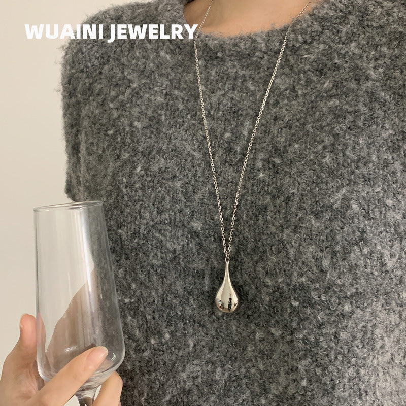 Water Droplets Sweater Chain Necklace For Women In Gold Featuring Titanium Steel Pendant And Cable Chain