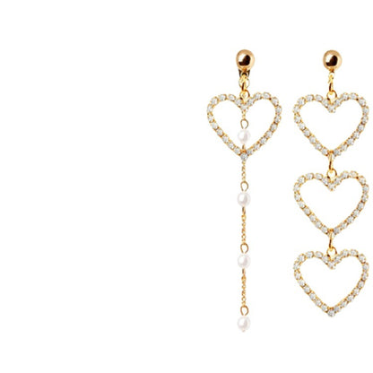 Heart Shape Asymmetrical Earrings In Gold Alloy With Electroplated Finish And Rhinestone Inlay