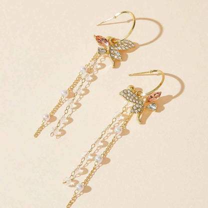 Sweet Bow Tie Earrings Made Of Alloy With Crystal Inlay Featuring Electroplated Gold Finish