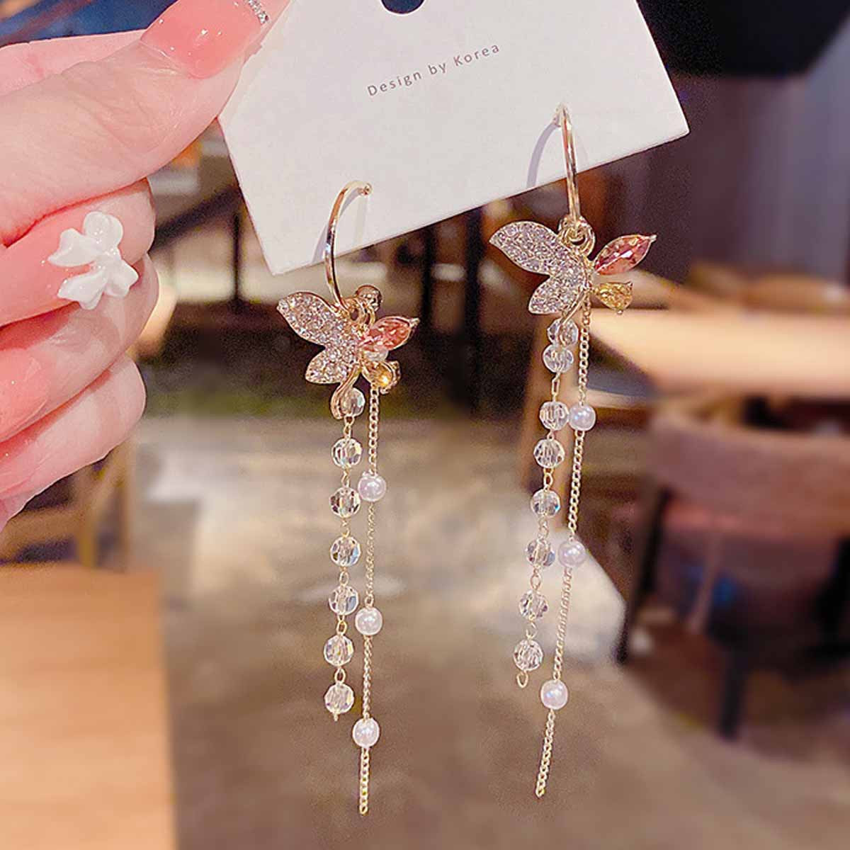 Sweet Bow Tie Earrings Made Of Alloy With Crystal Inlay Featuring Electroplated Gold Finish