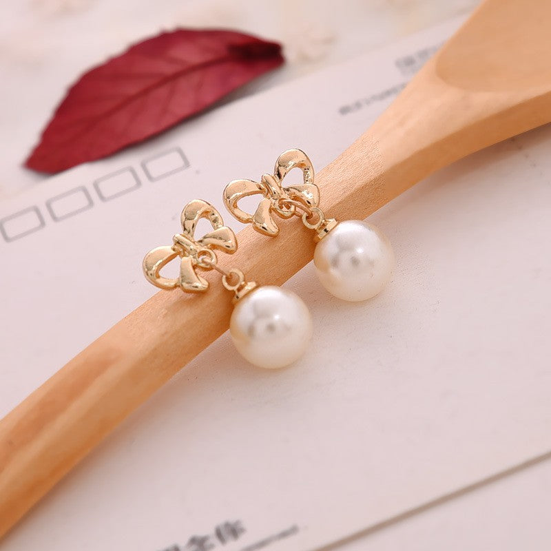 Sweet Gold Bow Tie Drop Earrings For Women, Electroplated Alloy With Artificial Pearl Inlay