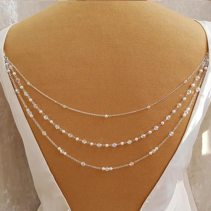 Silver Alloy Body Chain For Women Featuring Pearl Pattern And Electroplated Finish With White Crystal Inlay