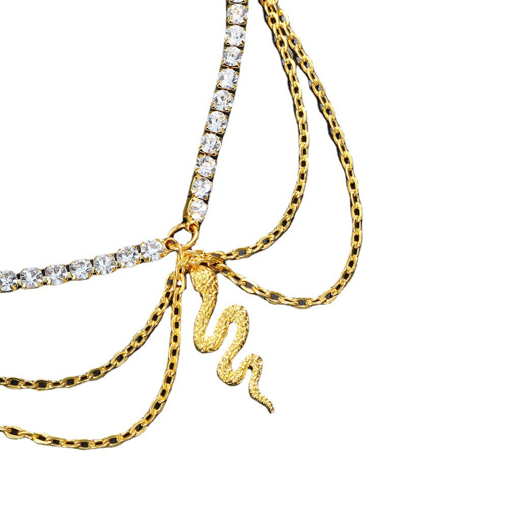 Gold Alloy Women's Anklet Featuring Snake Pattern With Artificial Gemstones, Perfect For Beach Wear