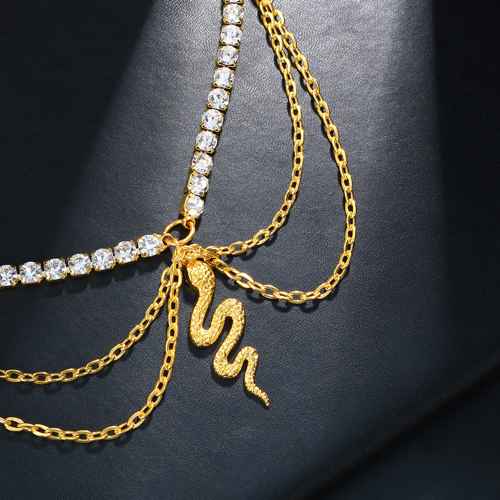 Gold Alloy Women's Anklet Featuring Snake Pattern With Artificial Gemstones, Perfect For Beach Wear