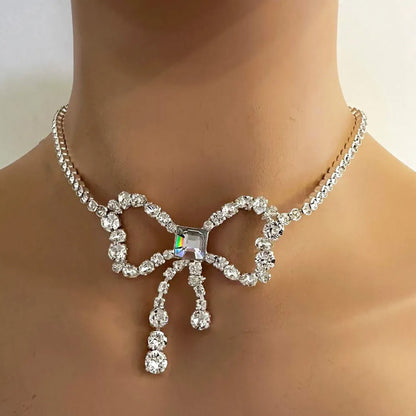 Silver Alloy Bow Tie Choker Necklace With Tassel, Electroplated Finish And Rhinestone Pendant For Women