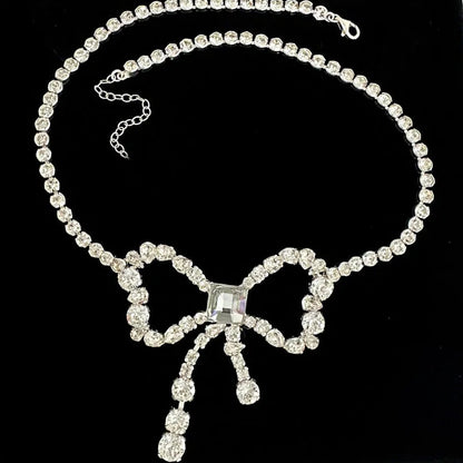 Silver Alloy Bow Tie Choker Necklace With Tassel, Electroplated Finish And Rhinestone Pendant For Women