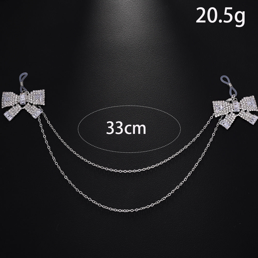 Silver Alloy Body Chain For Women Featuring White Crystal Inlay And Elegant Bow Tie Pattern