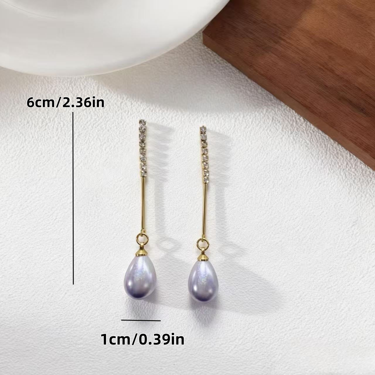 Elegant Water Droplets Stud Earrings For Women In Silver Featuring 925 Sterling Silver Ear Pins And Copper Material