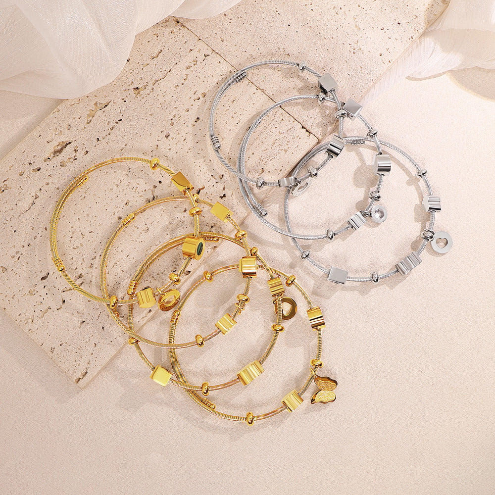 Braid Pattern Letter Bangle In Gold Titanium Steel With Spring Ring Trigger Clasp Closure
