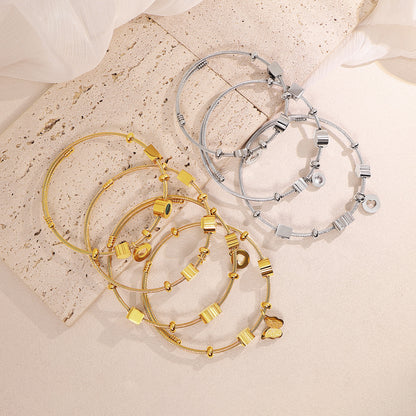 Braid Pattern Letter Bangle In Gold Titanium Steel With Spring Ring Trigger Clasp Closure